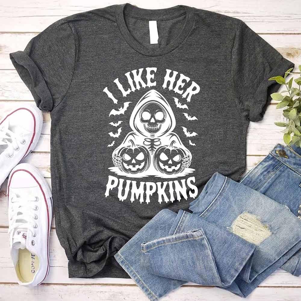 Dark gray Halloween T-shirt with skull and pumpkins graphic and “I Like Her Pumpkins” text