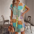 Multi-color woven short-sleeve V-neck button dress with geometric circle pattern, above-knee length