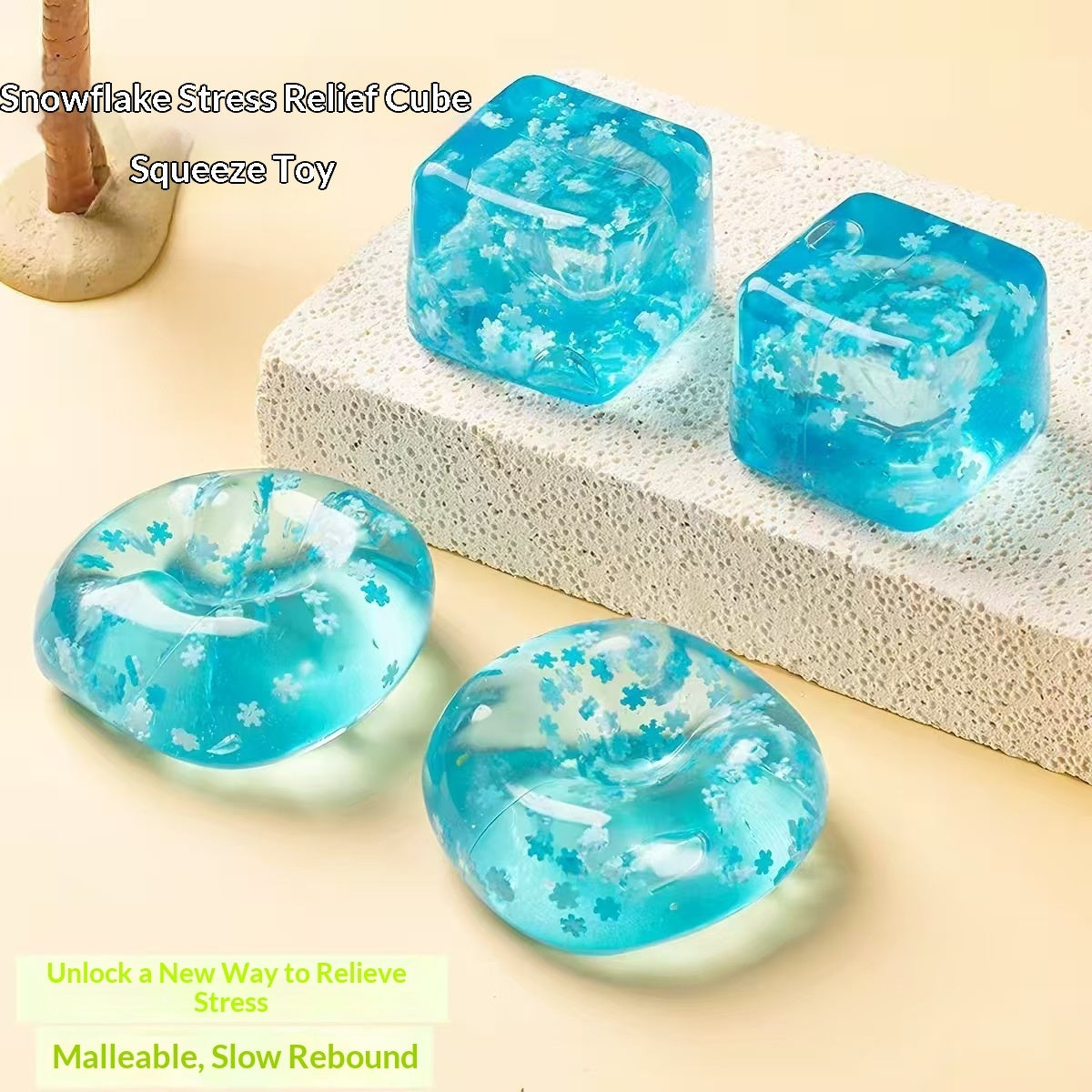 Blue water-cube stress-relief squishy toy with snowflake print, translucent