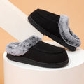 Black suede fleece-lined slippers with gray plush cross strap detail and black sole