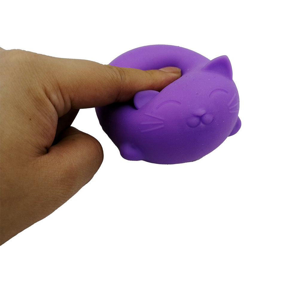 Purple cat-shaped stress relief venting ball being squeezed by a hand