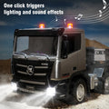 Black RC flatbed truck with trailer, front grille, headlights and amber roof lights