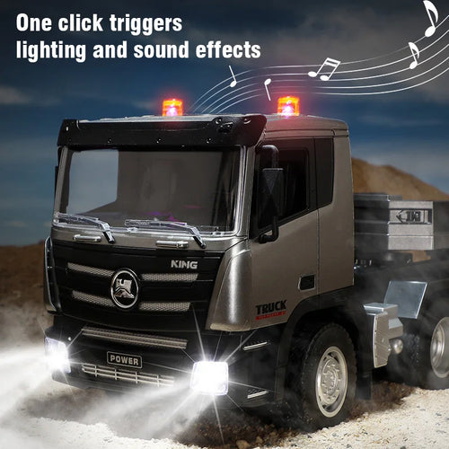 Black RC flatbed truck with trailer, front grille, headlights and amber roof lights