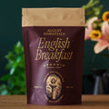August Essentials English Breakfast organic black tea pouch, dark maroon front