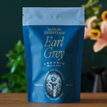 Stand-up tea bag pouch for August Essentials Earl Grey black tea, blue front panel