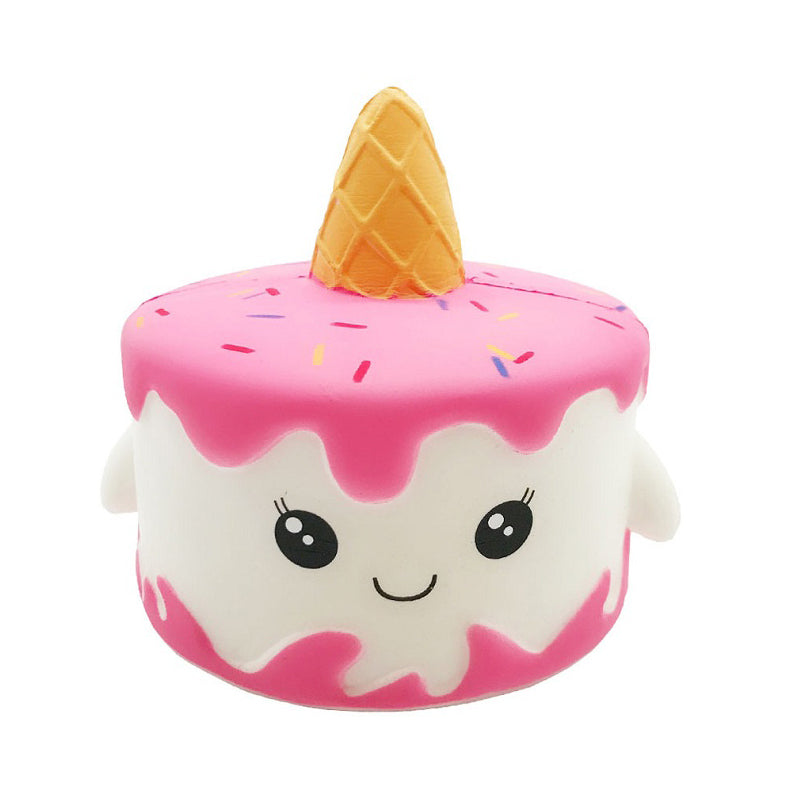 Pink and white ice cream squishy toy with sprinkles and a smiling face