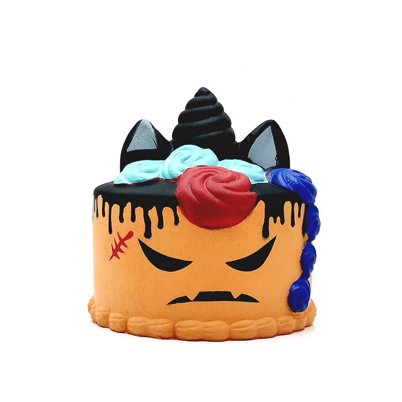 Chocolate-themed cake squishy toy with red rose, angry face, and dripping icing