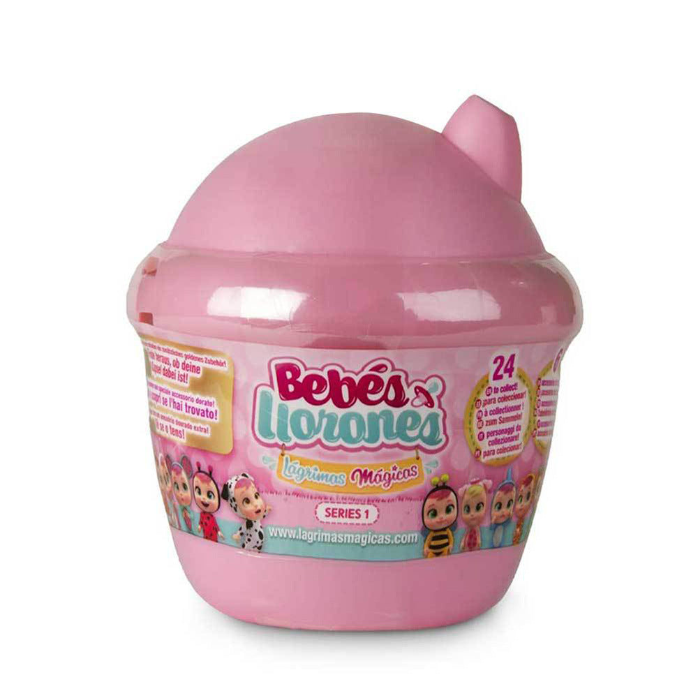 Pink blind box baby doll in capsule-shaped surprise container