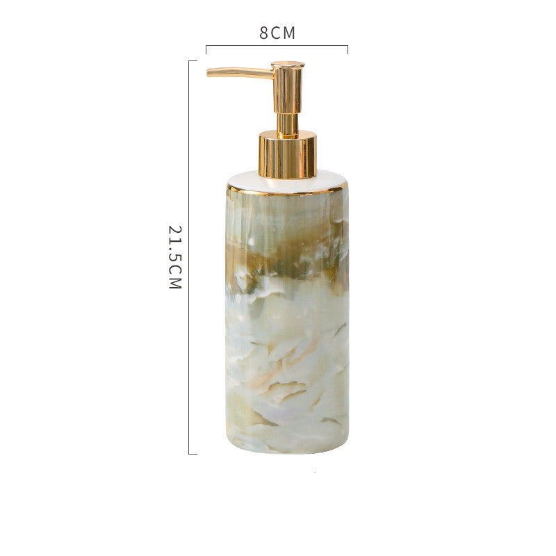 Ceramic dispenser bottle with marbled gemstone pattern and gold pump