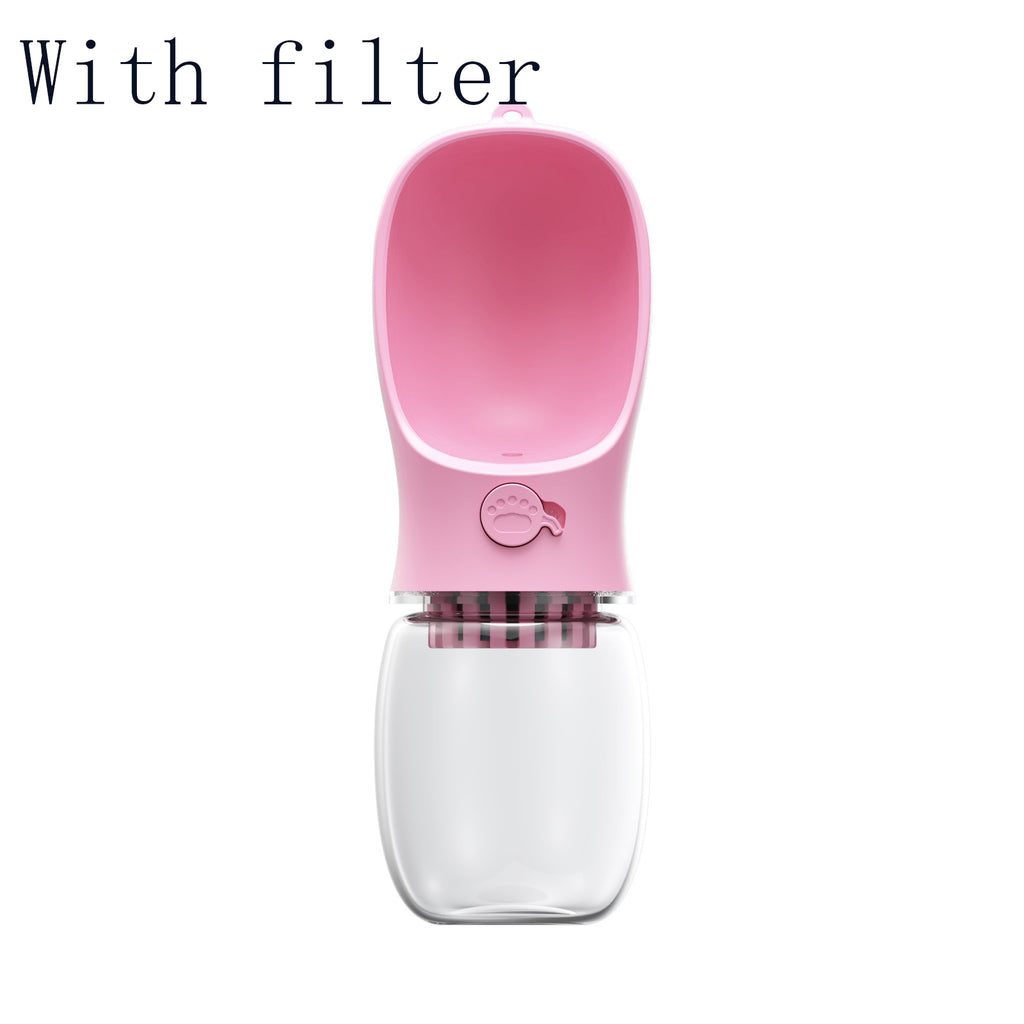 Portable pet water bottle with filter, pink top and clear base, drinking spout open