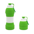 Green collapsible silicone water bottle with white foldable body and carabiner loop