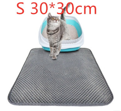 Honeycomb cat litter mat, gray textured honeycomb with kitten beside litter tray