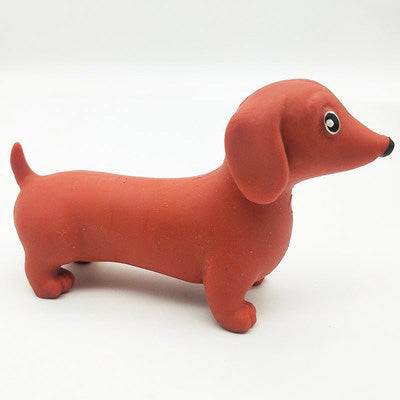 Red-orange dachshund stretch toy with floppy ears and dot eye
