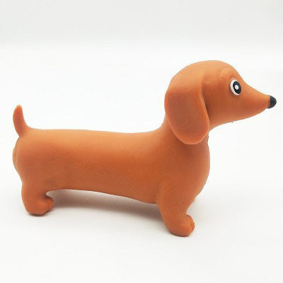 Orange dachshund stretch toy with floppy ears and round eye