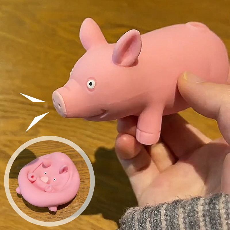 Pink pig squishy stress toy with round ears and large snout