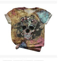 Tie-dye short-sleeve T-shirt with centered skull graphic, round neck.