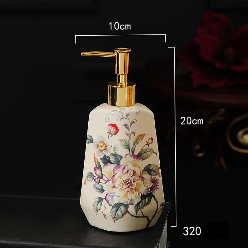 Hand-painted ceramic lotion/soap dispenser bottle with floral bouquet and gold pump