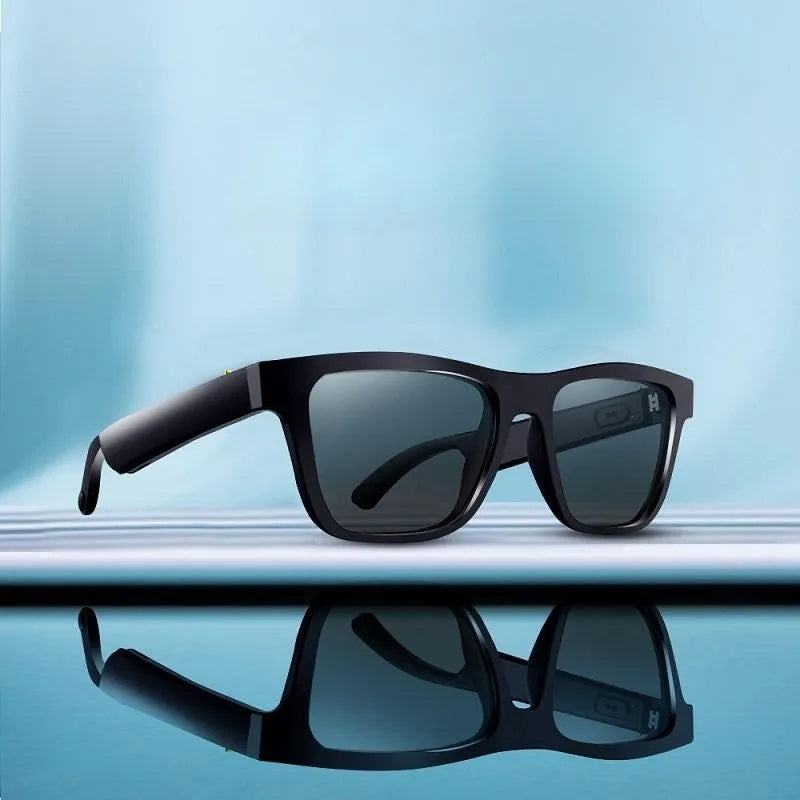 Black smart audio sunglasses angled with reflective dark lenses and temples