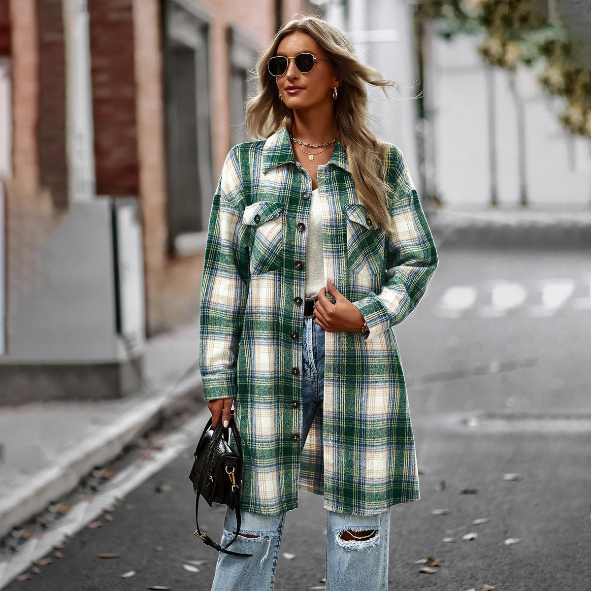 Green and cream plaid long cardigan coat with button front, patch pockets, and long sleeves