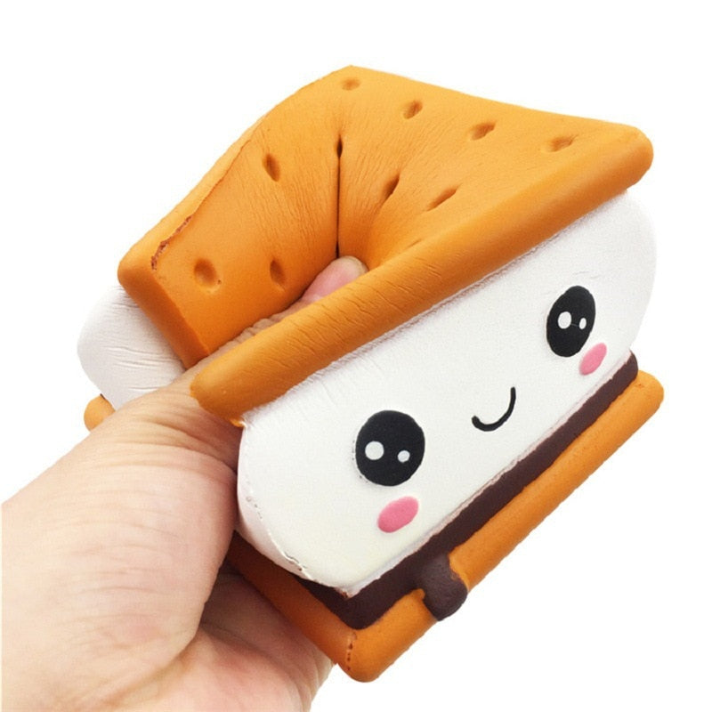 Plush biscuit sandwich toy featuring orange textured top and panda face detail