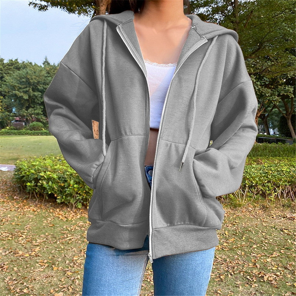 Women's hooded zip-front jacket in gray with front zipper, drawstring hood, and side pockets