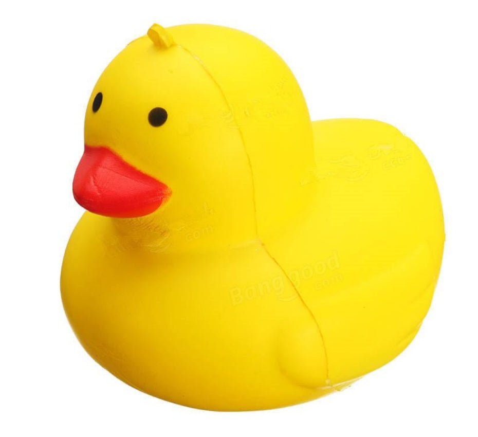 Slow-rising squishy toy yellow duck with orange beak and round black eyes