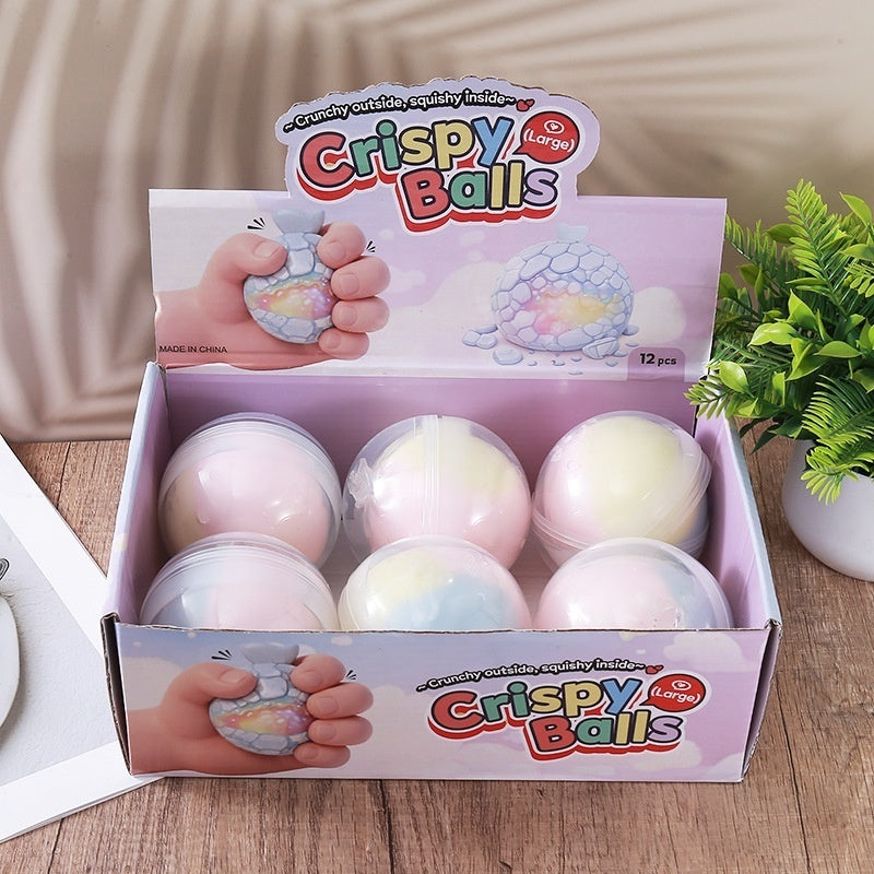 Crispy Balls stress-relief toy box with 12 squeeze balls in pastel colors