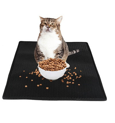 Honeycomb cat litter mat, black textured grid with cat and bowl on top