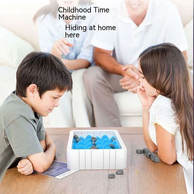 Magnetic chess tray with blue magnet pieces on table as children play
