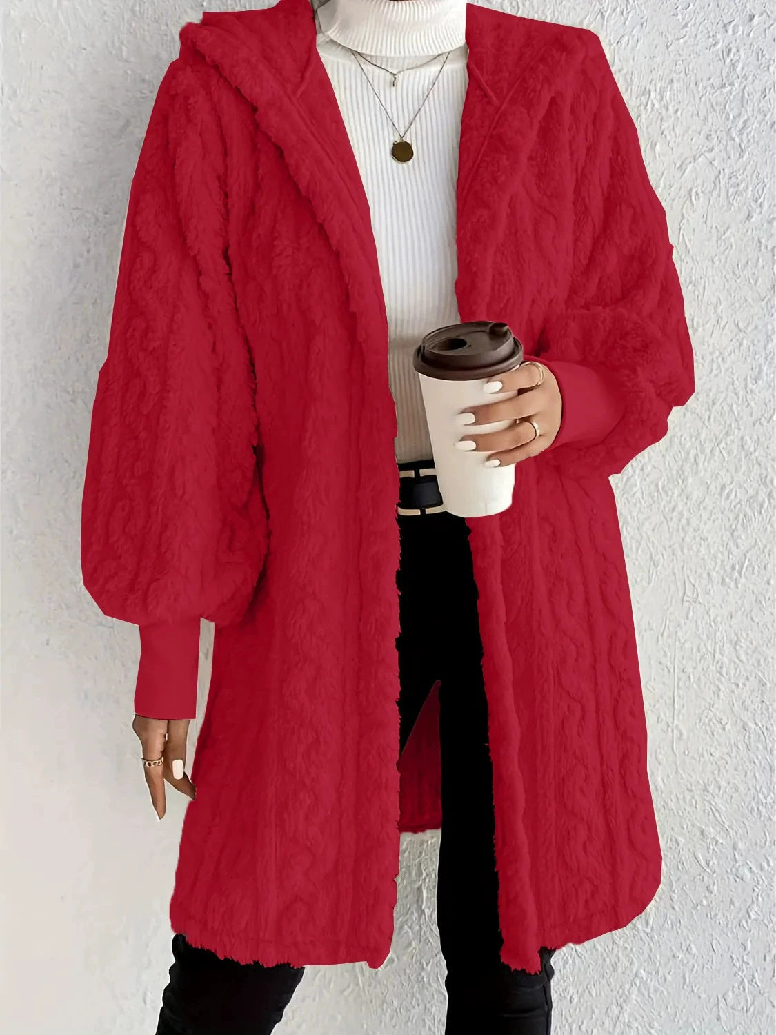 Hooded long plush coat in red, open front, plush textured fabric with hood.