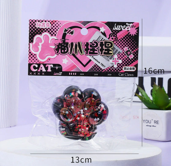 Dark red glitter cat paw stress toy in clear blister pack