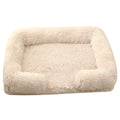 Cream plush enclosed round pet house with padded raised walls