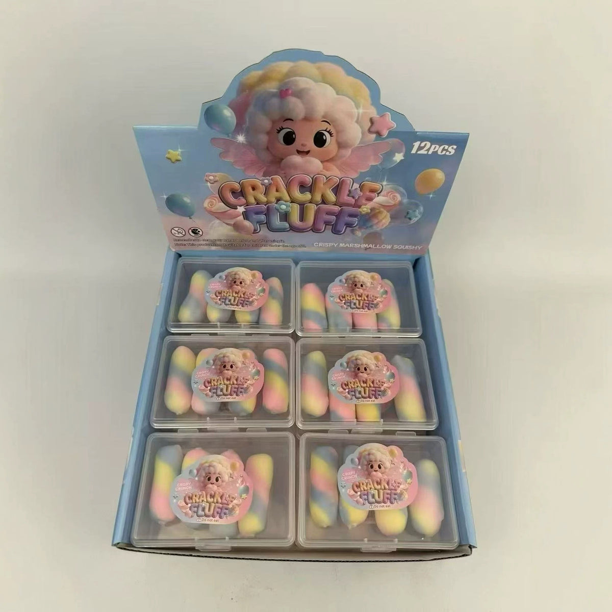 12-pack chocolate-themed squeeze toys in blue display box, pastel cracked-surface designs