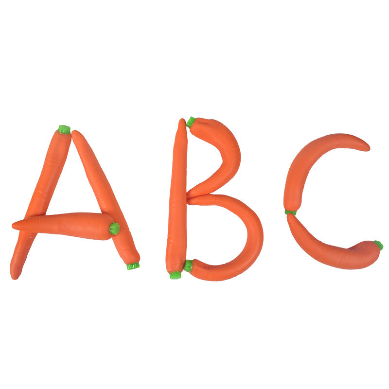 Orange carrot-shaped stress relief toy letters A B C with green caps