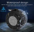Portable waterproof Bluetooth speaker with suction cup mount, black with gray control panel