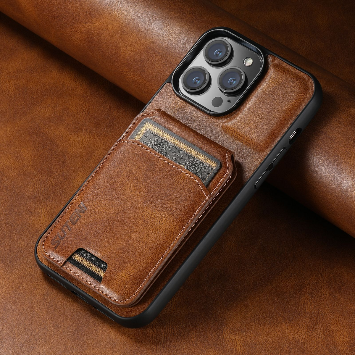 Tan leather phone case close-up with cardholder pocket and visible stitching