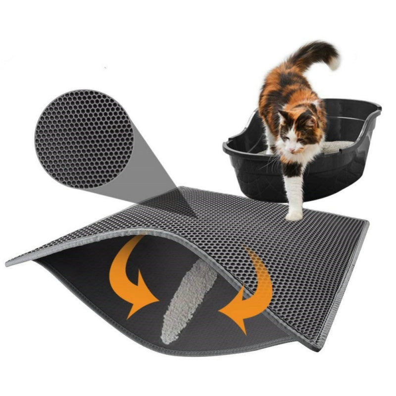 Honeycomb cat litter mat, dark gray/black textured surface with curved edge