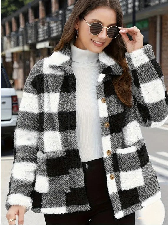 Women’s white and black buffalo plaid single-breasted jacket with button front and lapel collar.