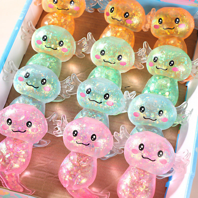 Assorted glitter slime salamander stress-relief ball toys in a display tray