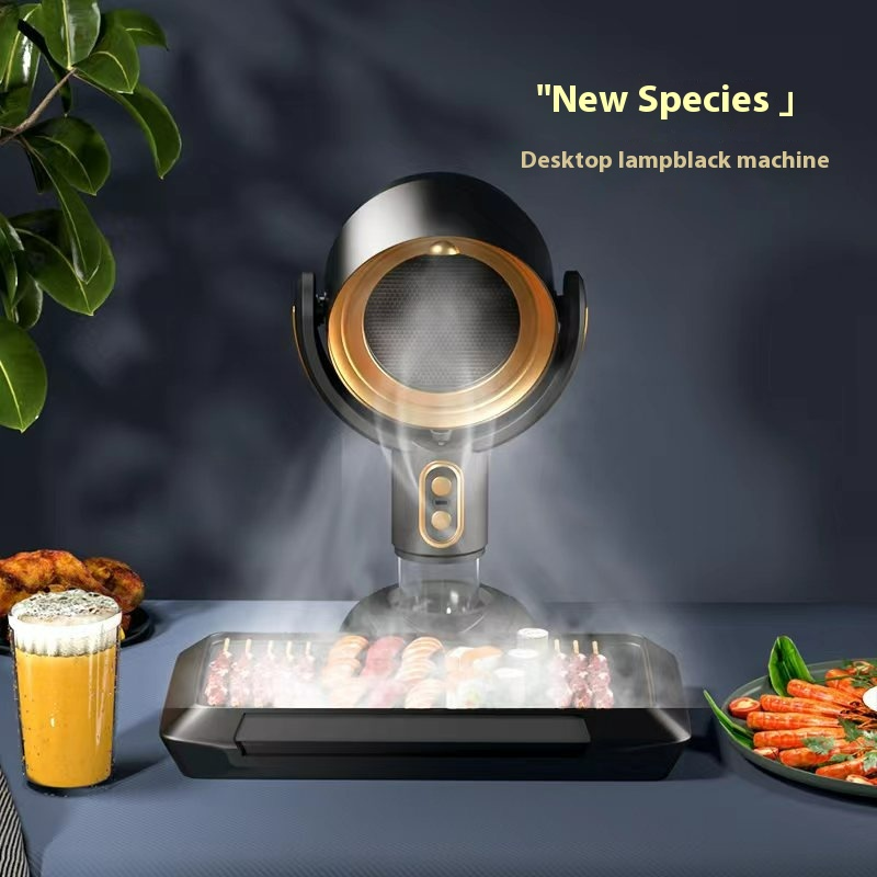 Portable desktop range hood smoke remover in black with gold ring, mist over base
