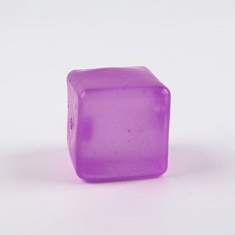 Purple translucent cube squeeze stress-relief toy with matte glossy finish.