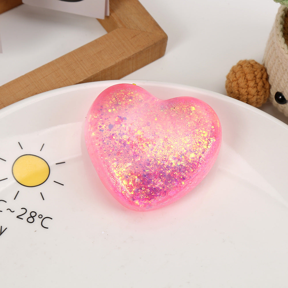 Pink glitter heart squeeze stress toy