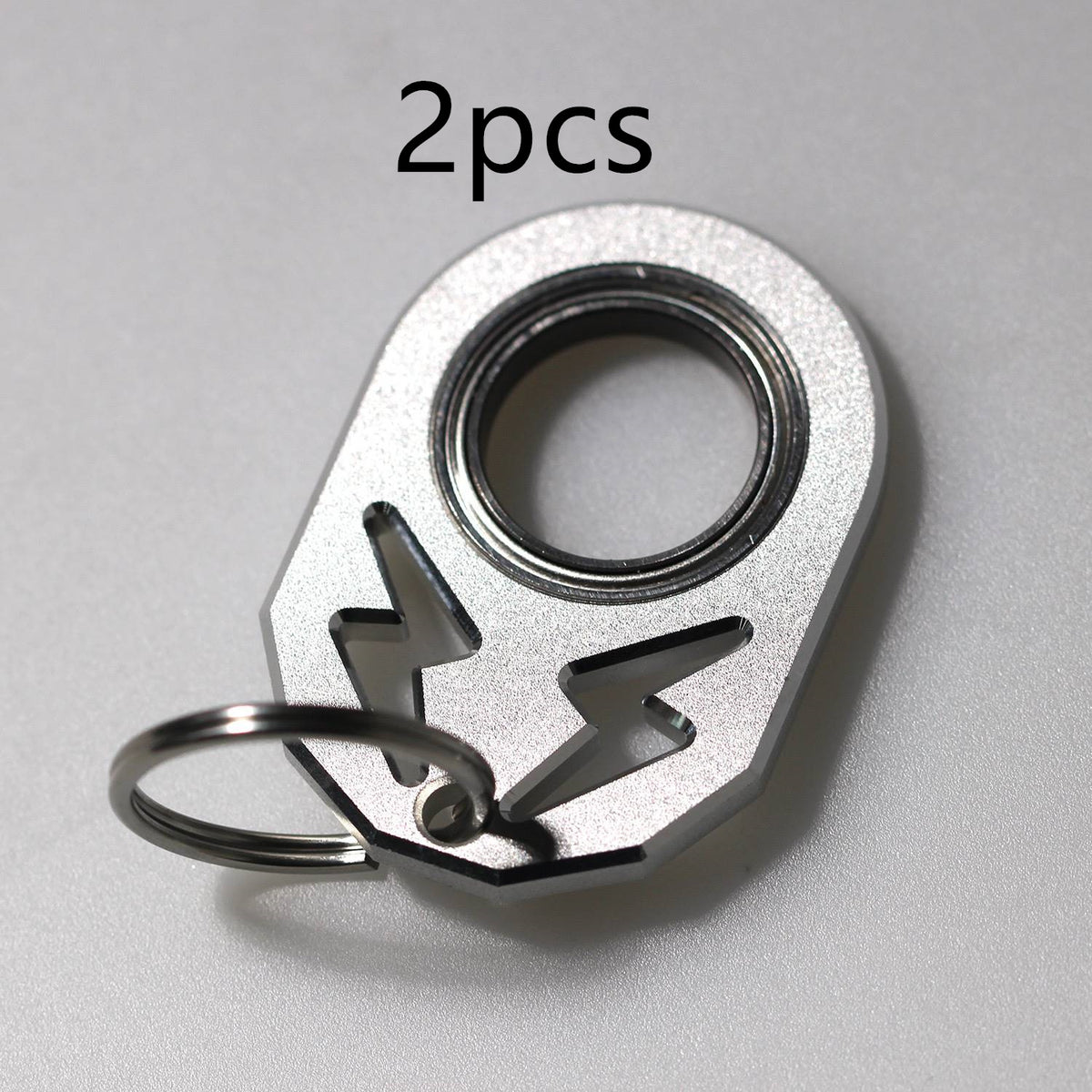 Silver rotating key chain with black inner ring and hook, labeled 2pcs.