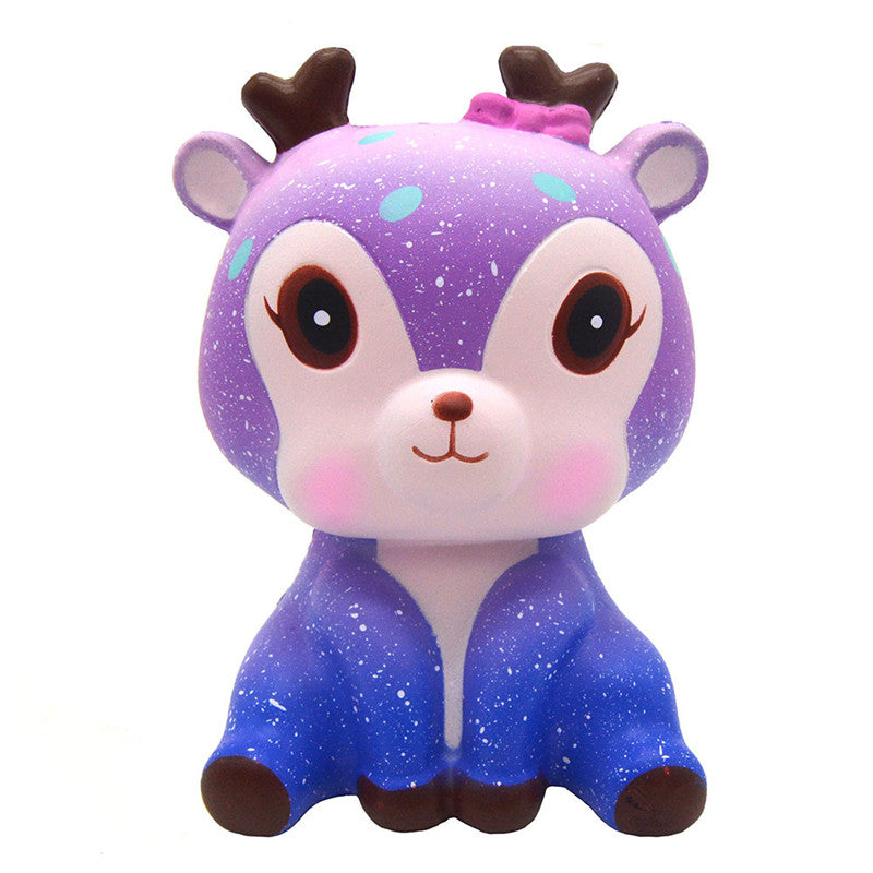 Purple glitter bear squishy toy with big eyes, brown ears, and a small nose