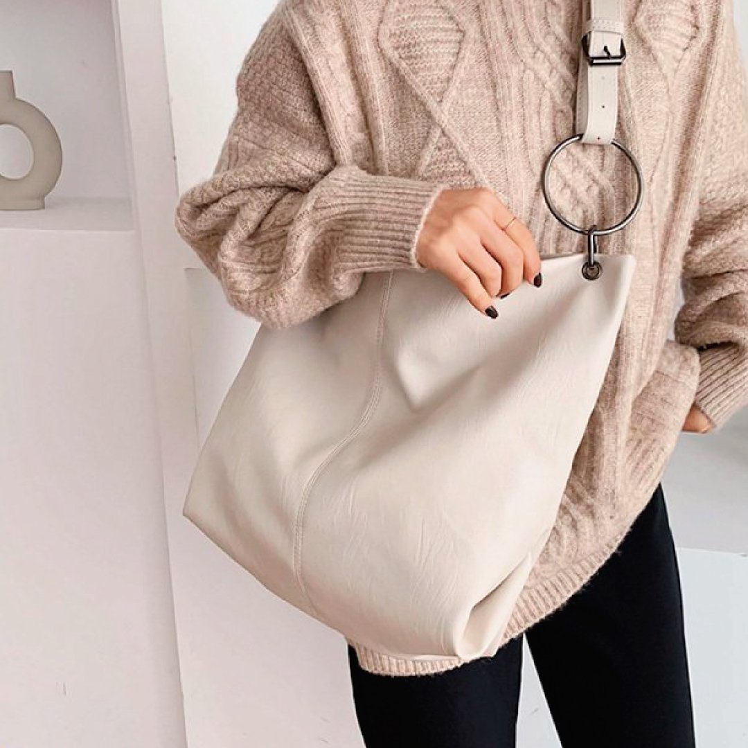Ivory slouch shoulder tote bag with long strap and stitched seams
