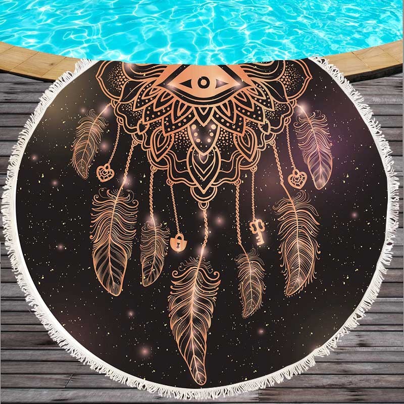Round beach towel with colorful feathers and tassels