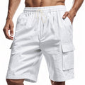 White linen drawstring cargo shorts with elastic waist and side flap pockets