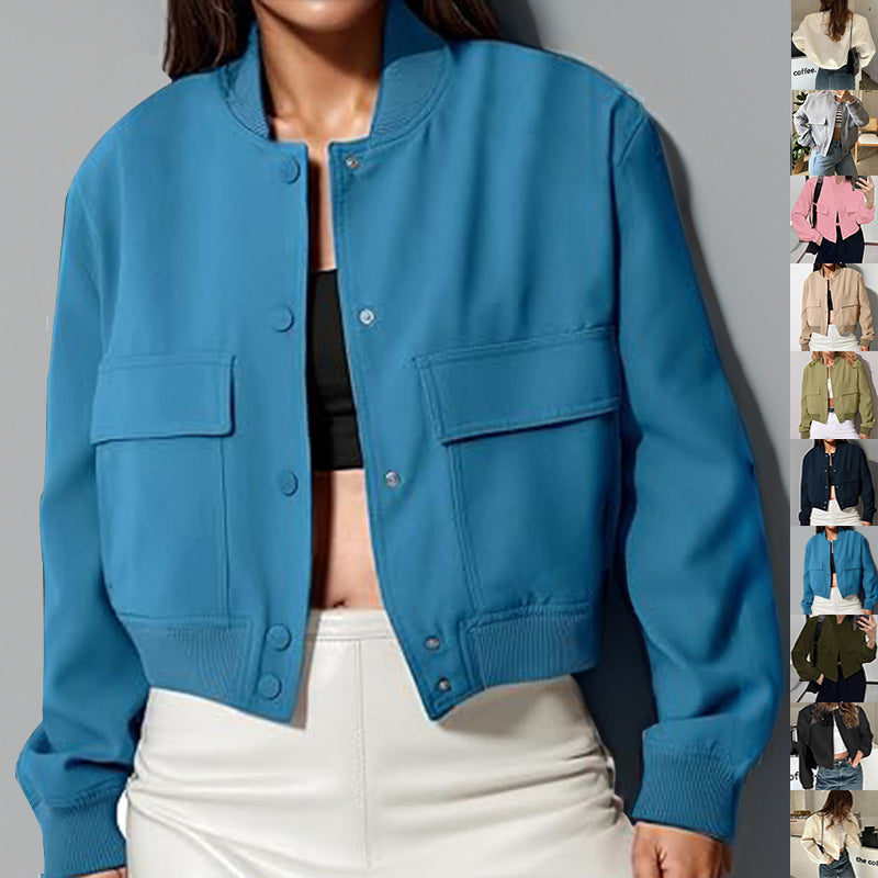 Blue button-up stand-collar jacket with snap cuffs and chest pockets, long sleeves