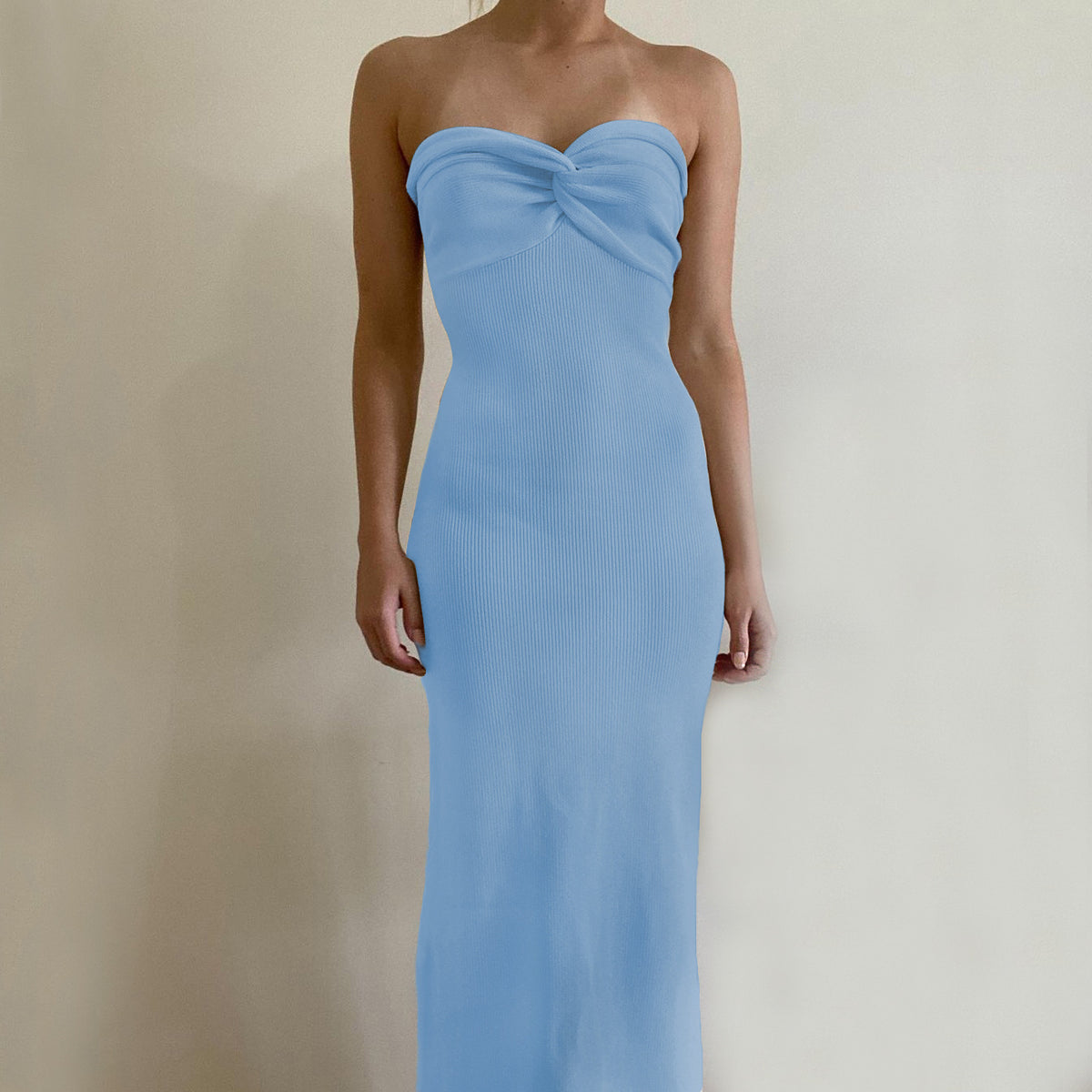Off-shoulder knit wrap dress in light blue with knotted neckline, long silhouette