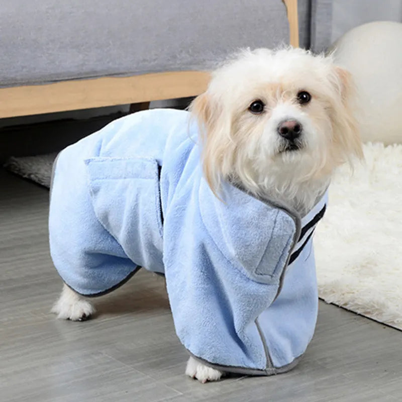 Light blue pet bathrobe towel on dog with dark trim along the front